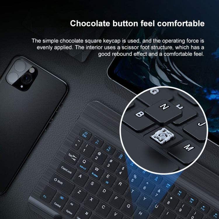Black mini Bluetooth keyboard close-up with comfortable square keycaps.