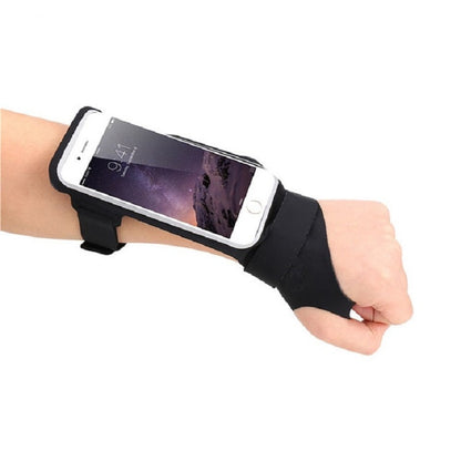 Black phone wrist bag worn on arm with clear front window and secure closure tabs