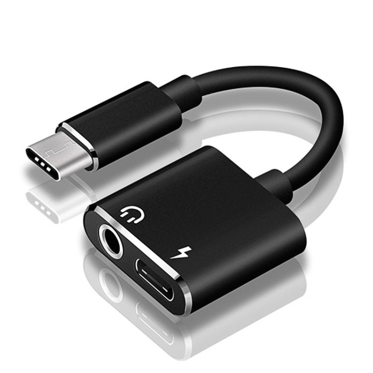 Black USB-C to dual-port audio adapter: 3.5mm headphone jack and USB-C charge