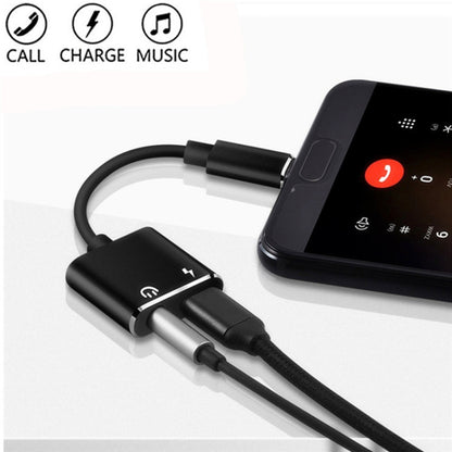 Black USB-C aux and USB-C charging adapter cable with 3.5mm headphone port