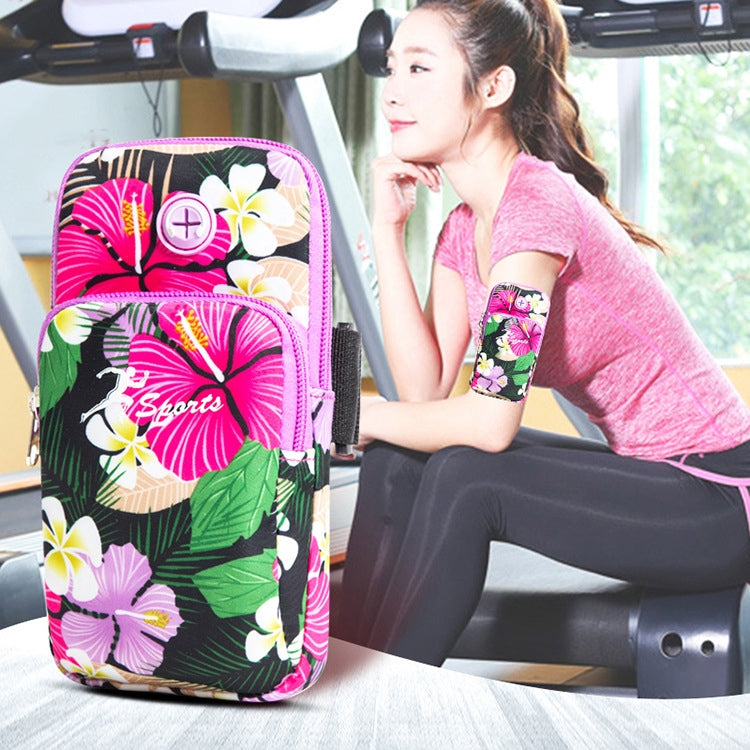 Sports phone arm bag with floral pink design, front zip pocket and armband