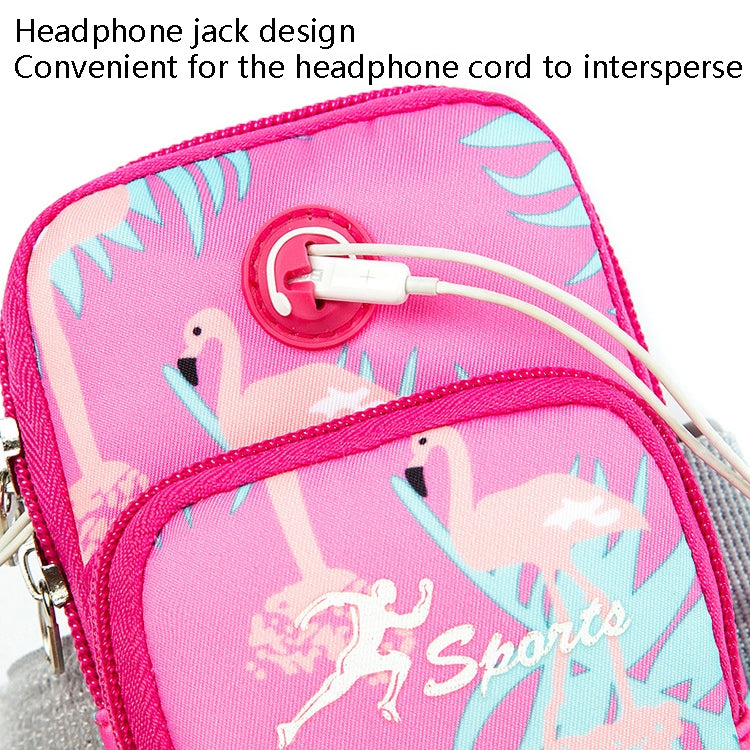 Pink patterned phone arm bag with headphone jack port and large front pocket