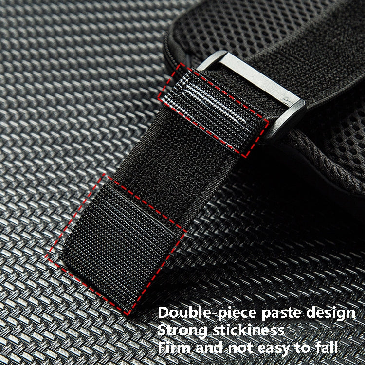 Close-up of black fabric panel with stitched edges on a phone armband bag