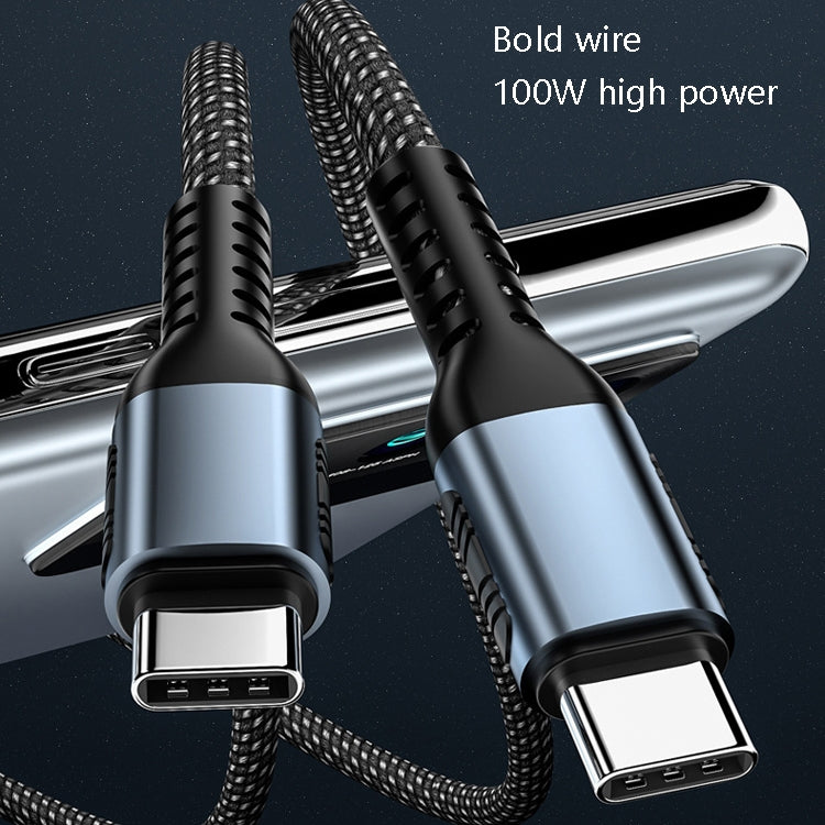 Black braided Type-C charging cable with silver ends, close-up