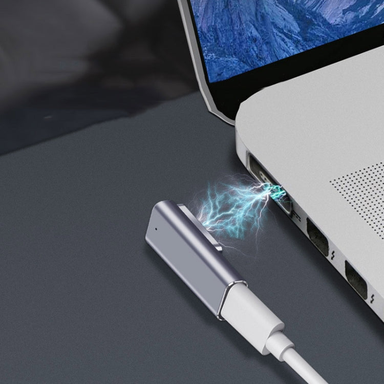 Type-C to Magsafe adapter connected to a USB-C port on a laptop