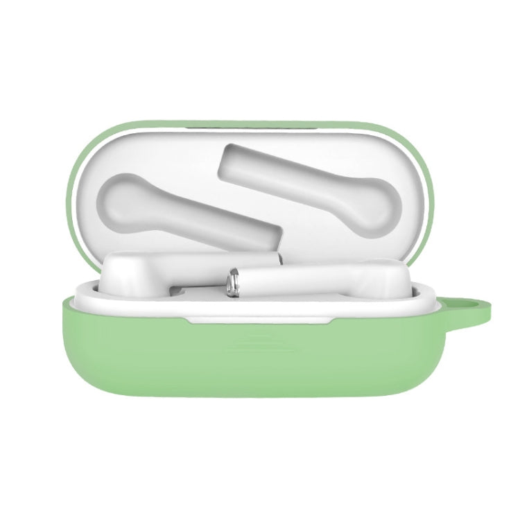 Matcha green silicone protective case for Bluetooth earbuds, open with white earbuds inside