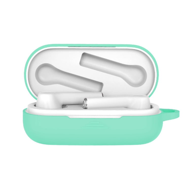 Mint green silicone protective case for Bluetooth earbuds, open with white earbuds inside
