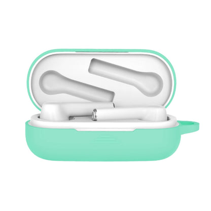 Mint green silicone protective case for Bluetooth earbuds, open with white earbuds inside