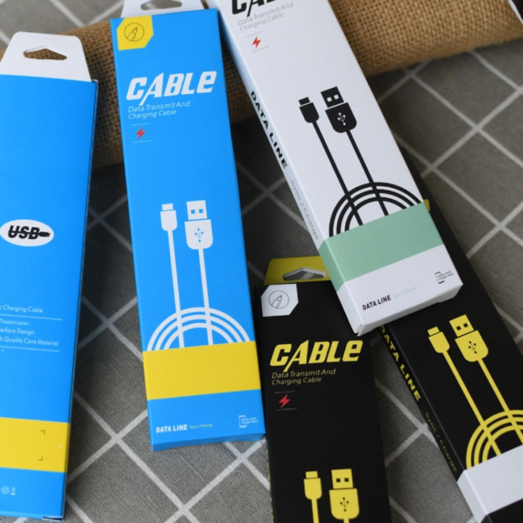 Assorted cable storage carton packaging boxes showing charging and data cable graphics in blue/white/yellow.