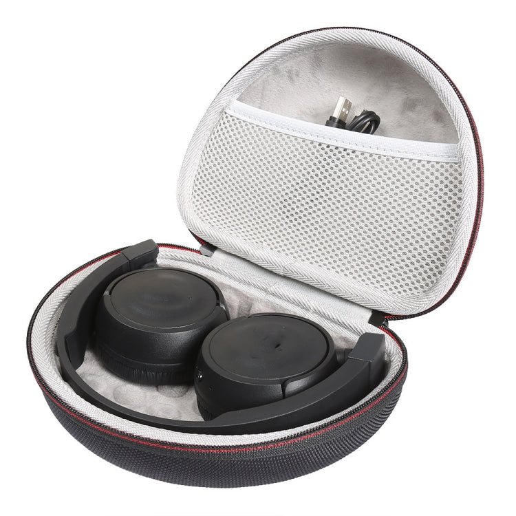 Open headphone case with white lining, two earcups and cable accessory