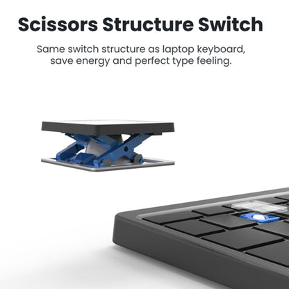 Black keyboard key switch detail on portable tablet keyboard with hidden touchpad base
