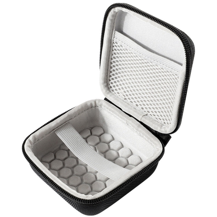 Hard-shell case with open lid and gray mesh organizer insert