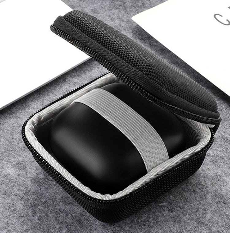 Open black hard-shell earbuds case showing molded earbud holder and strap