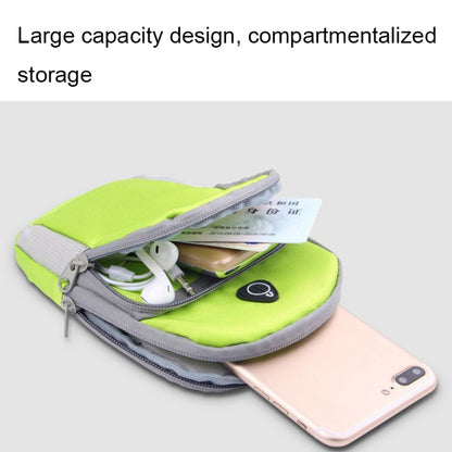 Green phone armband pouch open with storage space for phone and cards