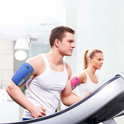 Runner wearing blue phone storage arm bag during fitness workout