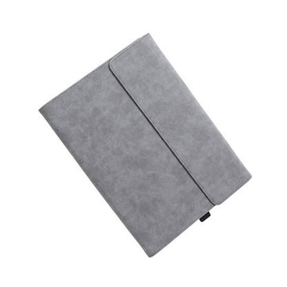 Gray protective tablet case with fold-over cover and seam detail