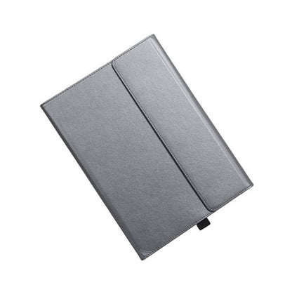 Gray protective tablet case with fold-over cover and stitched panel