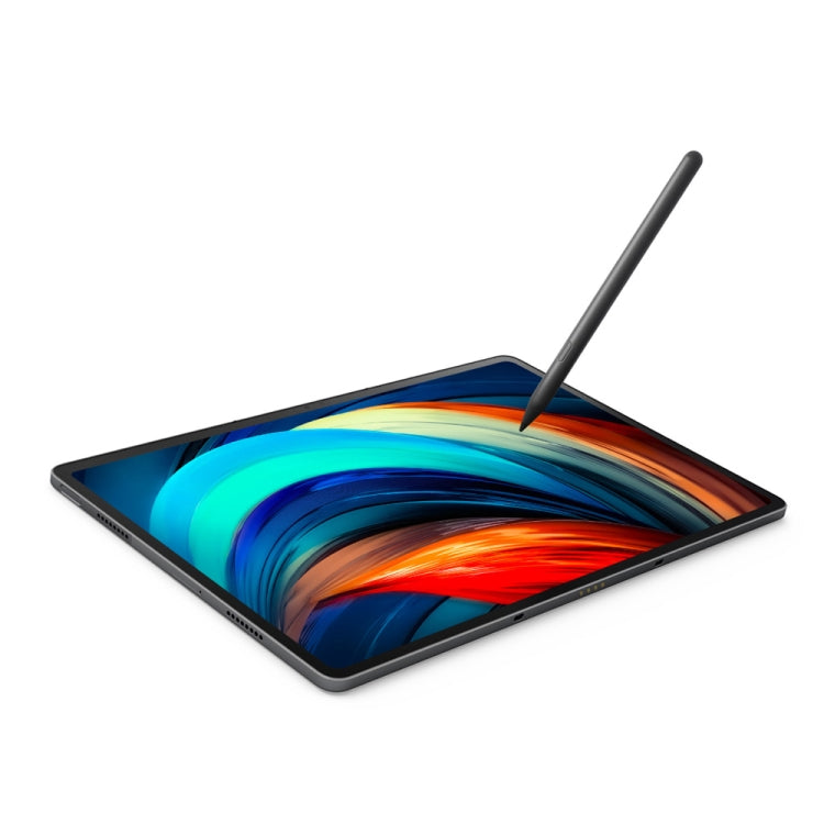 Black stylus pen hovering above tablet screen