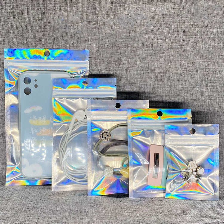 Assorted holographic self-sealing bags with hanging holes, holding small items