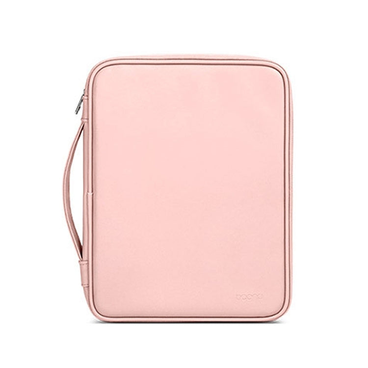 Light pink handheld tablet bag with front zipper edge and wrist strap