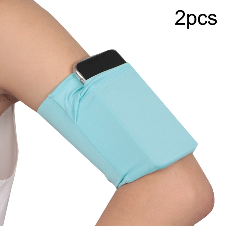 Light blue elastic phone armband set with secure pocket on wearer’s arm (2-pack).