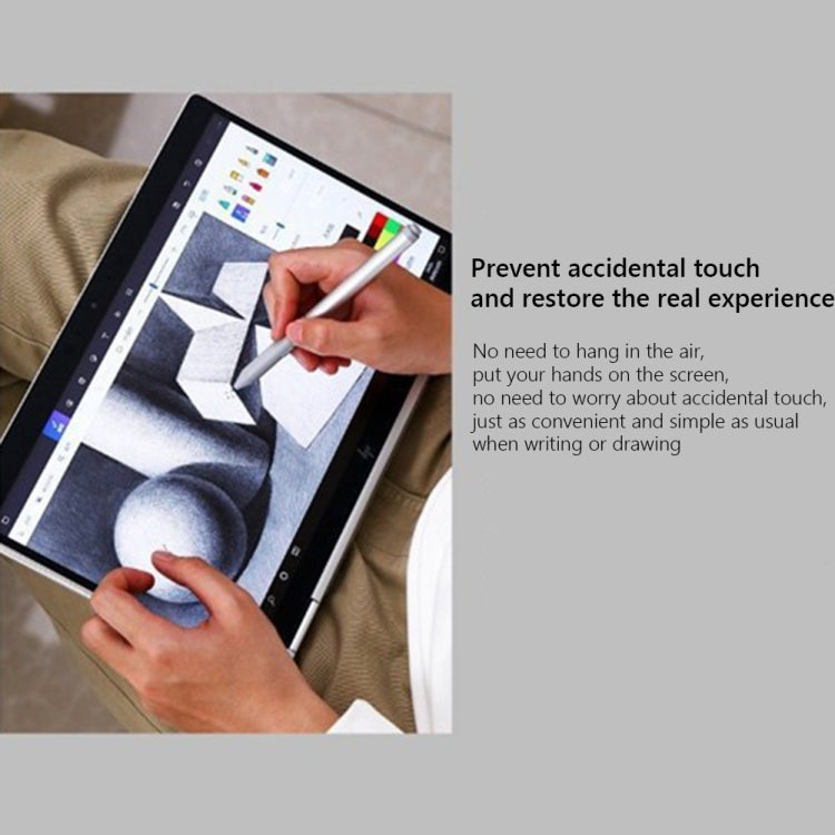 Gray touch pen stylus writing on a tablet screen with hand position