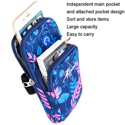 Blue floral phone arm bag with accessible pocket opening and attached carry strap
