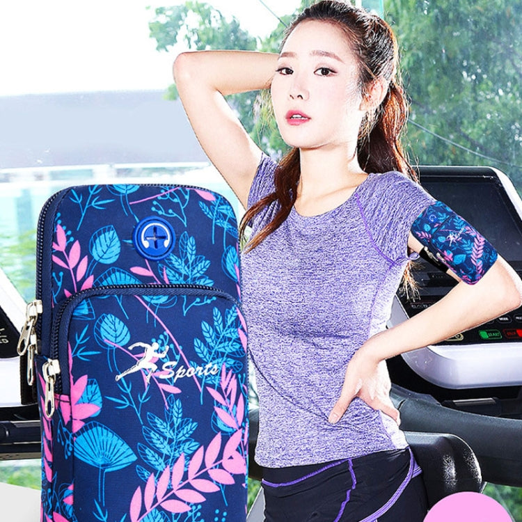 Blue leaf-pattern running mobile phone arm bag with zip pocket, worn on upper arm