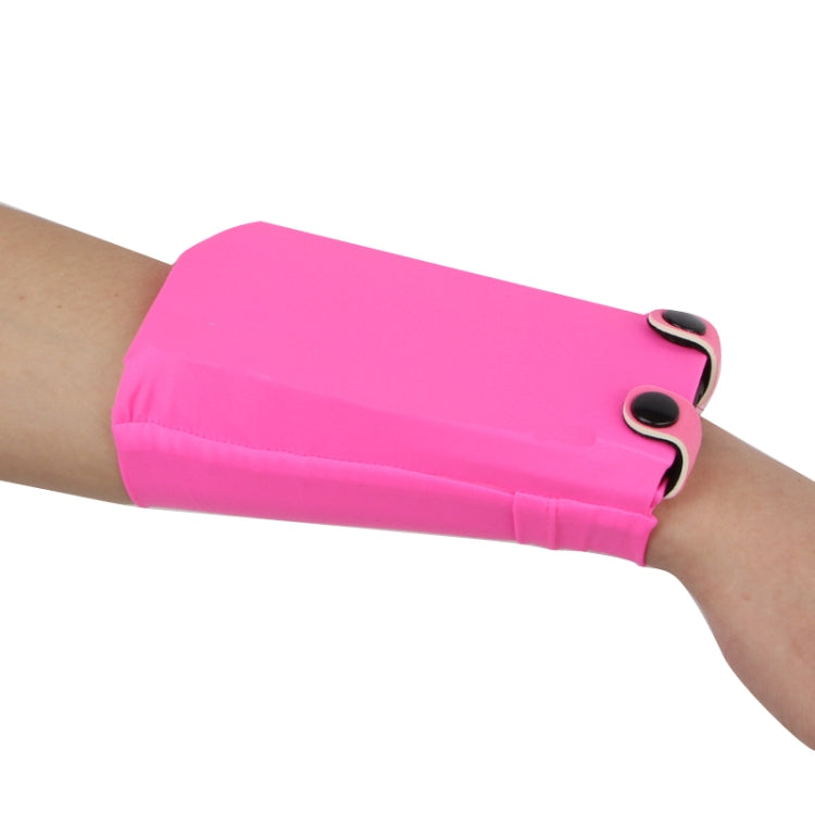 Pink solid phone wrist bag with snap closure and elastic strap