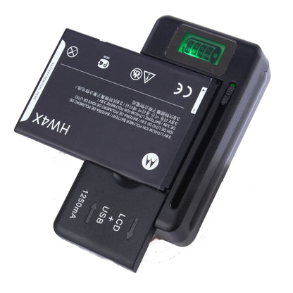 Black universal battery charger holding a battery with green LCD status screen