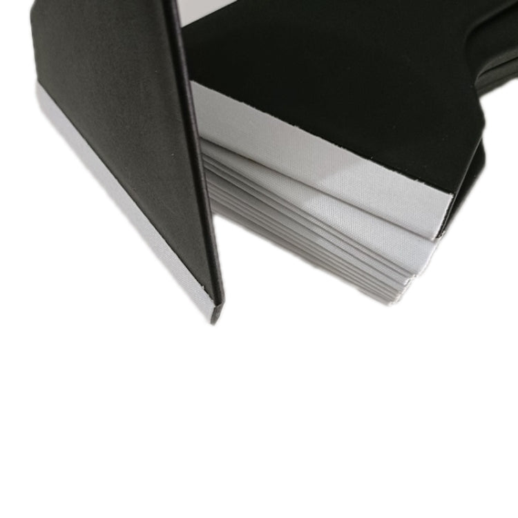 Stack of black phone film scraper blades with white edging for film removal