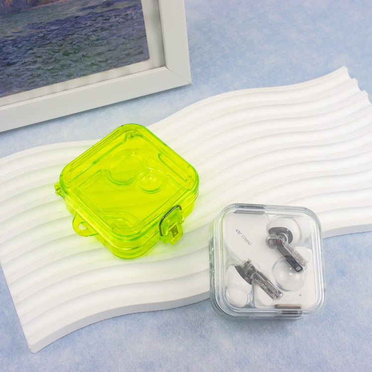 Transparent mirror earphone case in neon green and clear case with earbuds