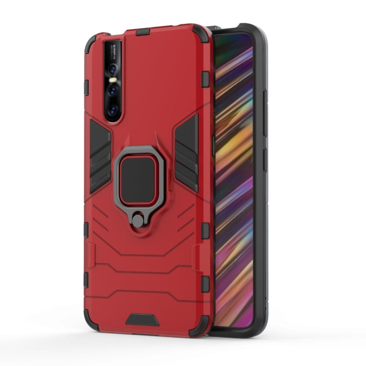 Red shockproof phone case with magnetic ring holder on back panel