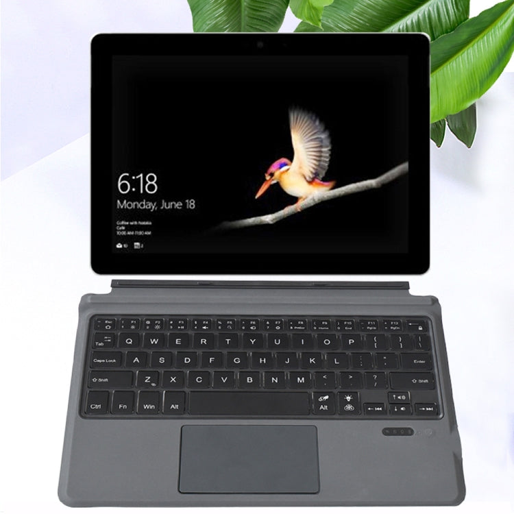 Folding Bluetooth keyboard with touchpad, dark keys under tablet stand