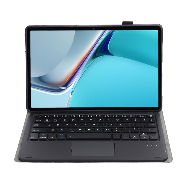 Black keyboard tablet case with touchpad and stand holding the tablet