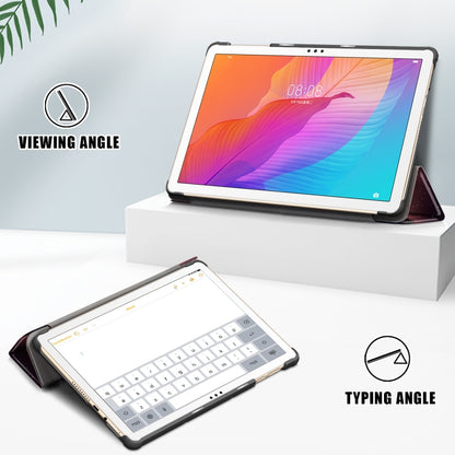 Tablet PC leather case on stand with keyboard cover angle; typing position view