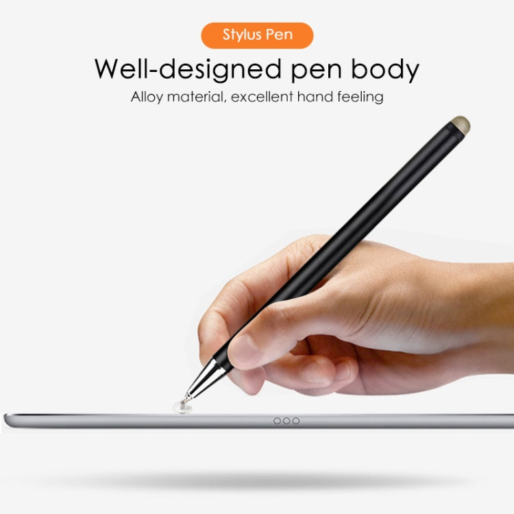Black magnetic stylus pen with fine fiber tip, held in hand