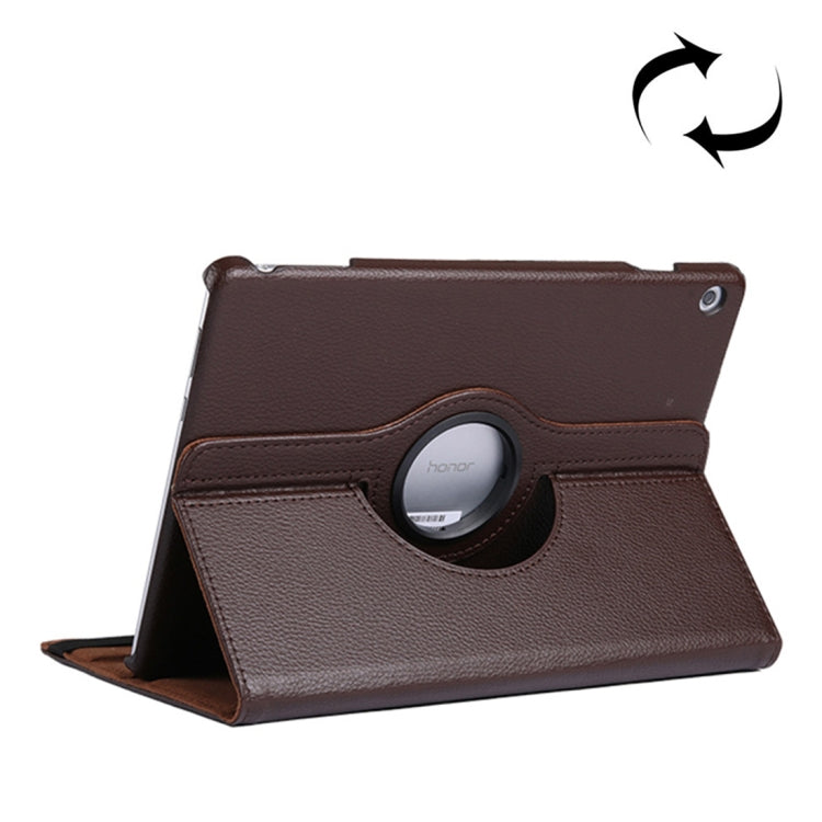 Brown leather-look flip tablet case with circular holder ring and standing support