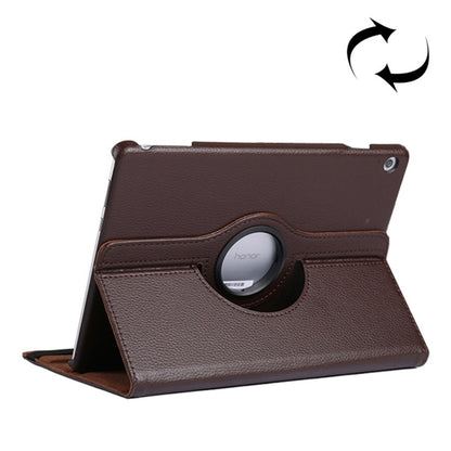 Brown leather-look flip tablet case with circular holder ring and standing support