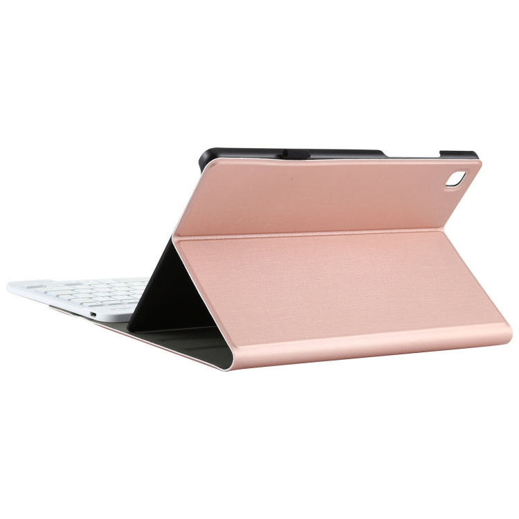 Rose gold tablet stand folio case with cover folded and white keyboard docked