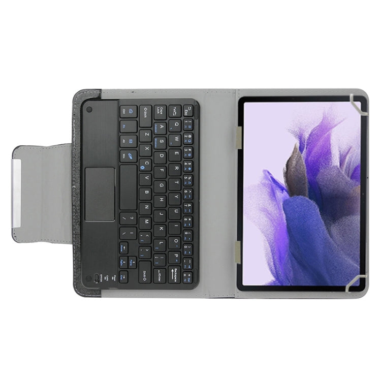 Black tablet keyboard case opened: built-in keyboard and stand for 7-inch tablet