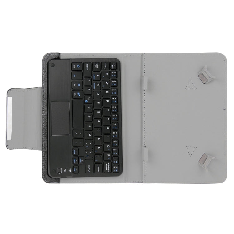 Tablet keyboard case open showing keyboard on left and snap stand on right