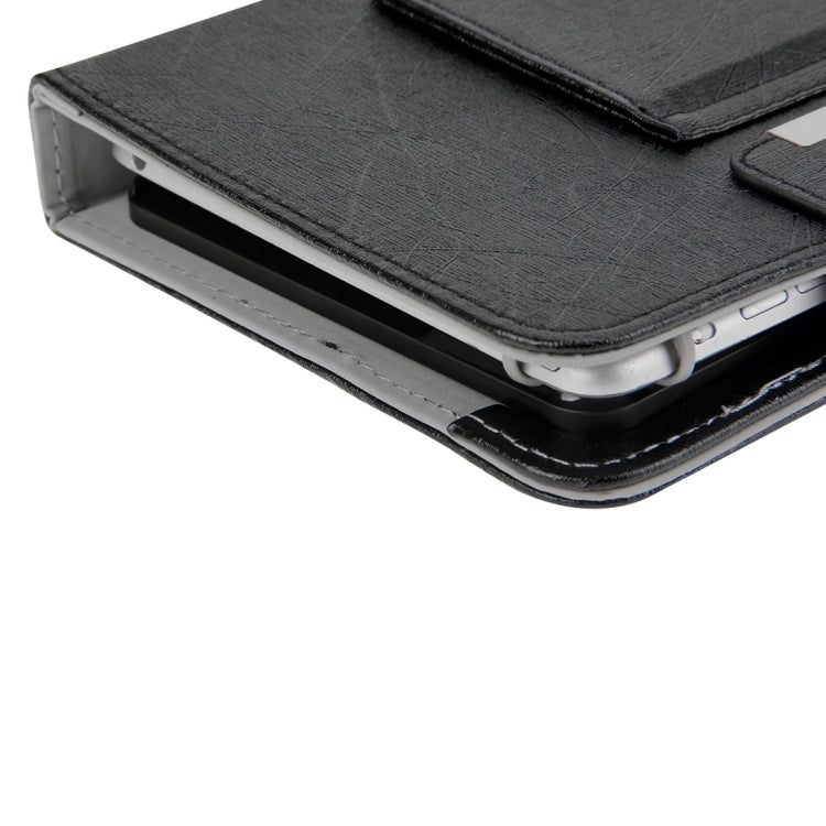 Close-up of black folio case edge and layered sleeve for tablet protection