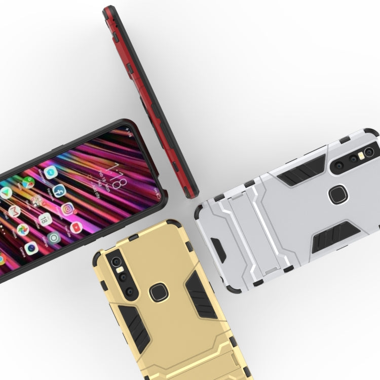 Shockproof phone case in gold, red, and white, with holder and camera cutouts