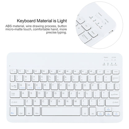 White Bluetooth keyboard with function keys and numeric layout on a light backing