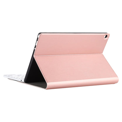 Rose gold tablet case with built-in viewing stand in open position