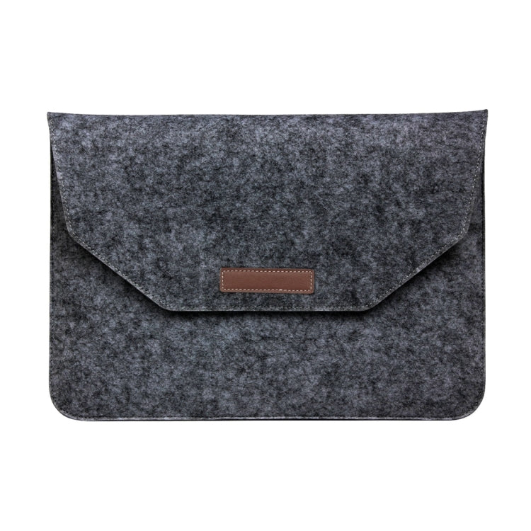 Grey felt tablet laptop sleeve with flap and brown leather-look logo patch