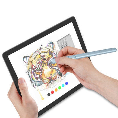 Blue stylus pen held over tablet screen for writing
