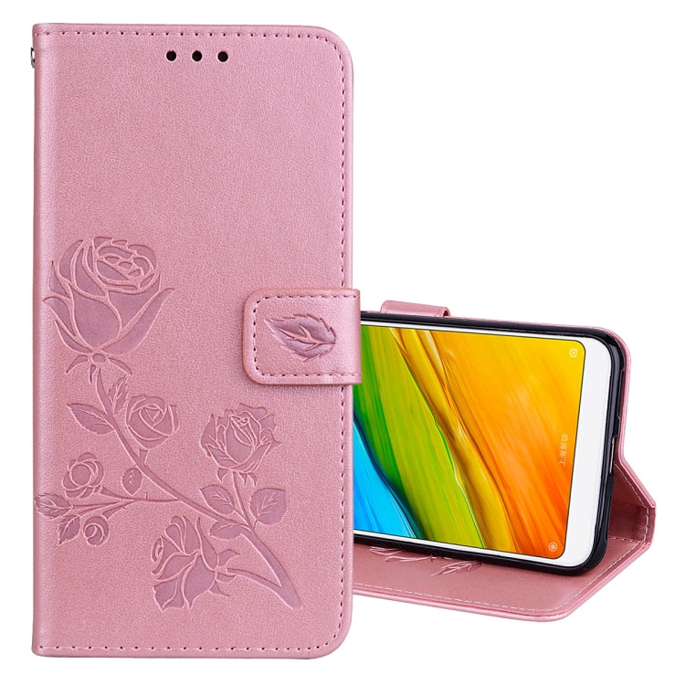 Pink rose-embossed PU leather flip wallet case with magnetic strap and phone view