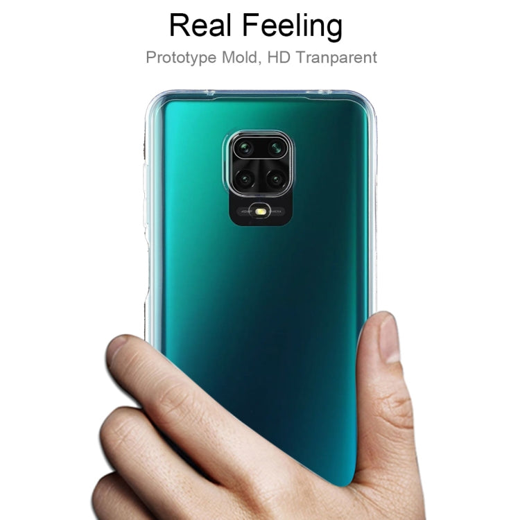 Transparent TPU phone case on a hand, showing camera cutout and slim profile
